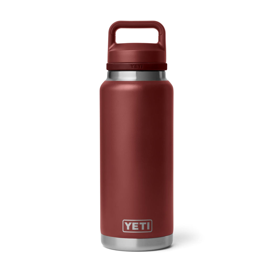 Red YETI Rambler 36 oz stainless steel water bottle with a matching Chug Cap and TripleHaul handle on a white background.