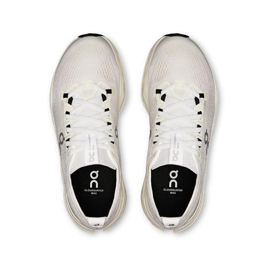 Top-down view of white On Running Cloudsurfer Max women's shoes with a breathable mesh upper and cushioned interior.