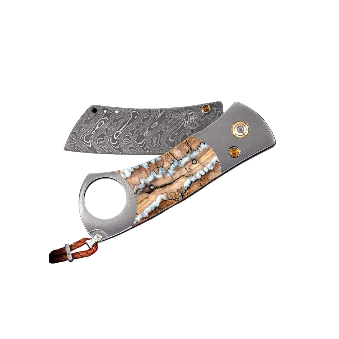 William Henry Epic cigar knife with Boomerang Damascus blade, fossil mammoth tooth inlay, and citrine accents.