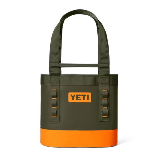 Olive green and bright orange YETI Camino 20 waterproof tote bag with durable handles and gear loops.