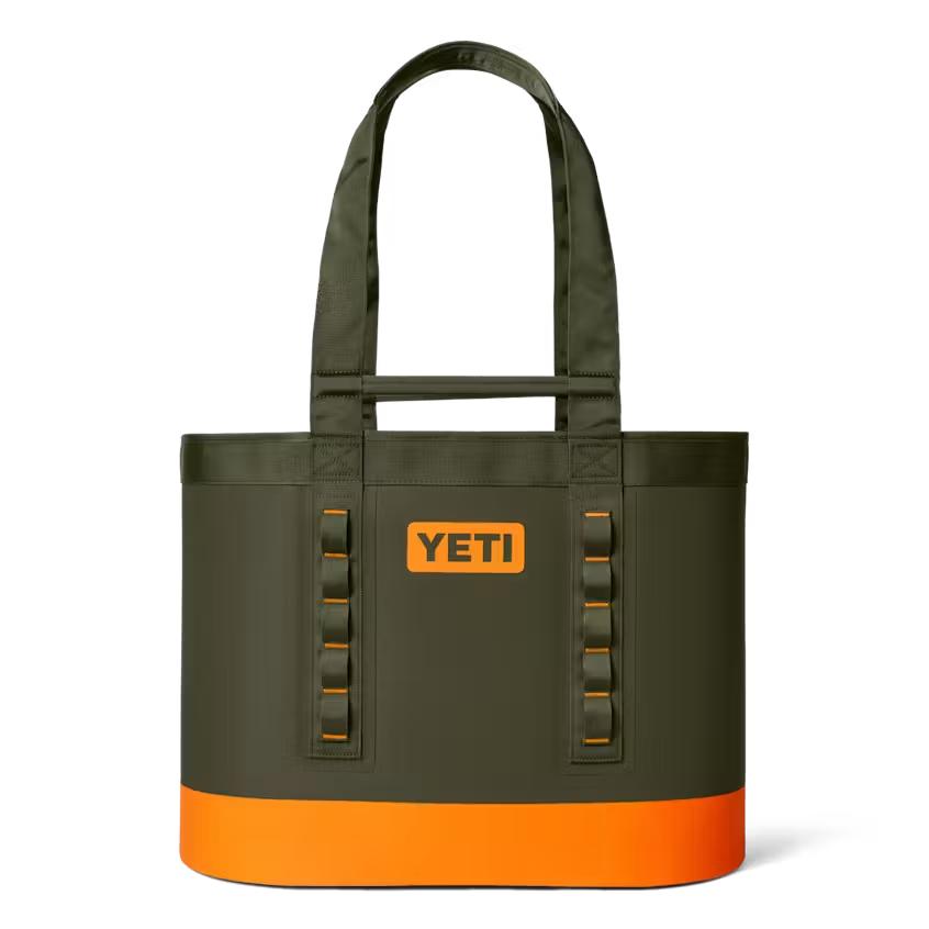 Olive green and bright orange YETI Camino 50 waterproof carryall tote with durable handles and gear loops.