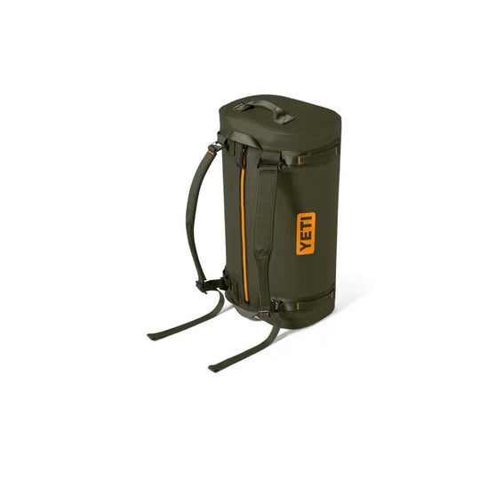 Olive green YETI Panga 50L submersible waterproof duffel bag with orange accents and durable backpack straps.