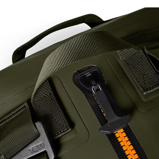 Olive green YETI Panga 50L waterproof duffel bag featuring a durable ThickSkin shell and a rugged HydroShield zipper.