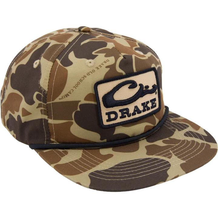 Drake X LOST camo cap with a black paracord rope detail and a rectangular Drake logo patch on the front.