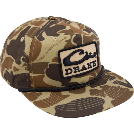 Drake X LOST camo cap with a black paracord rope detail and a rectangular Drake logo patch on the front.