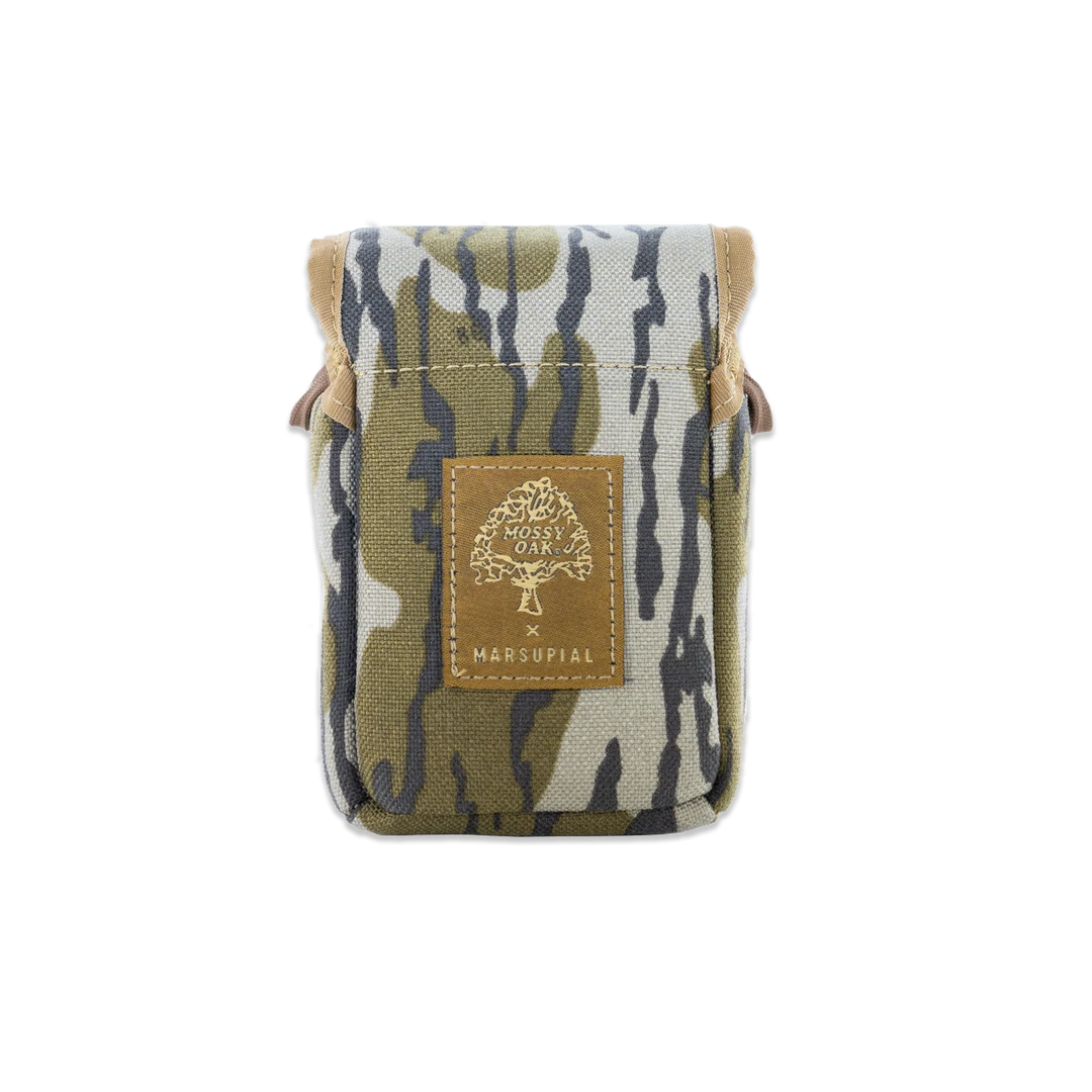A small canvas pouch with a green, beige, and gray camouflage pattern, featuring a brown leather patch on the front with a gold tree logo and the text 'MARSUPIAL'.