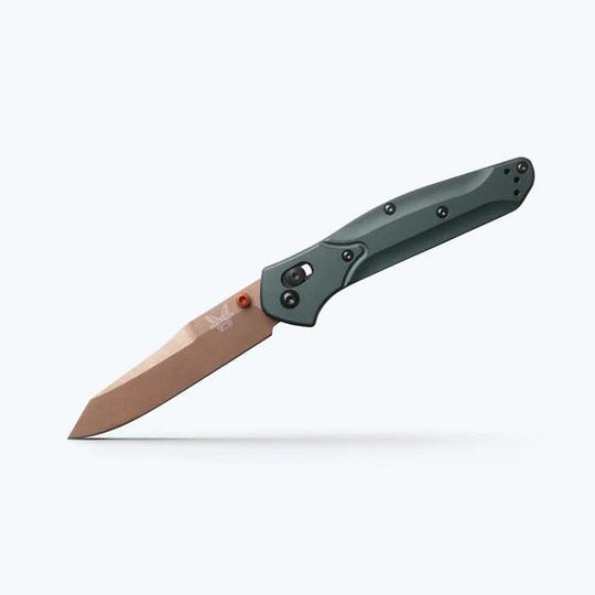 A folding pocket knife with a matte rose gold blade and a dark green handle, shown open against a clean white background.