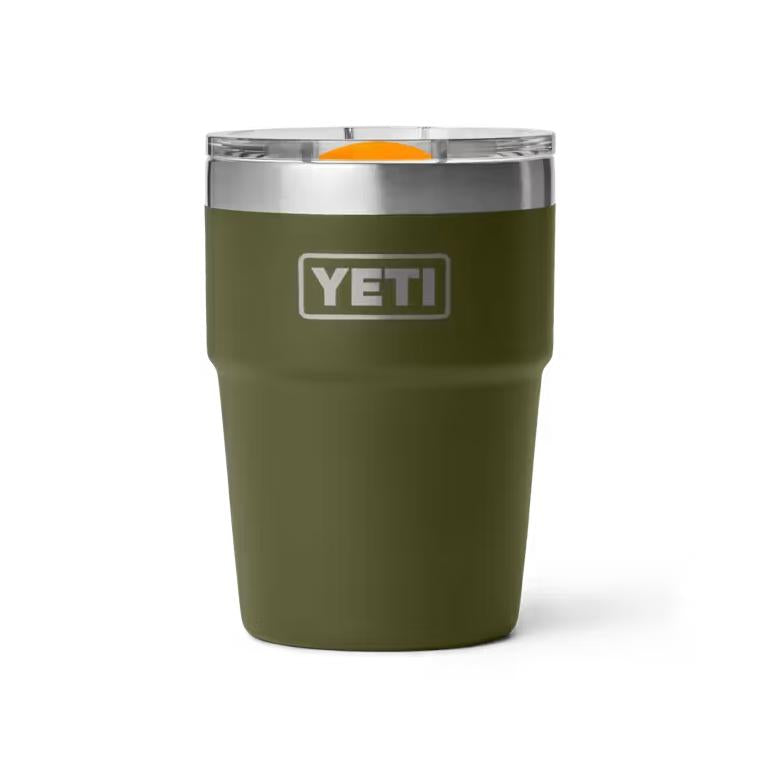 Olive green YETI Rambler 16 oz stackable cup with stainless steel rim and clear MagSlider lid on a white background.