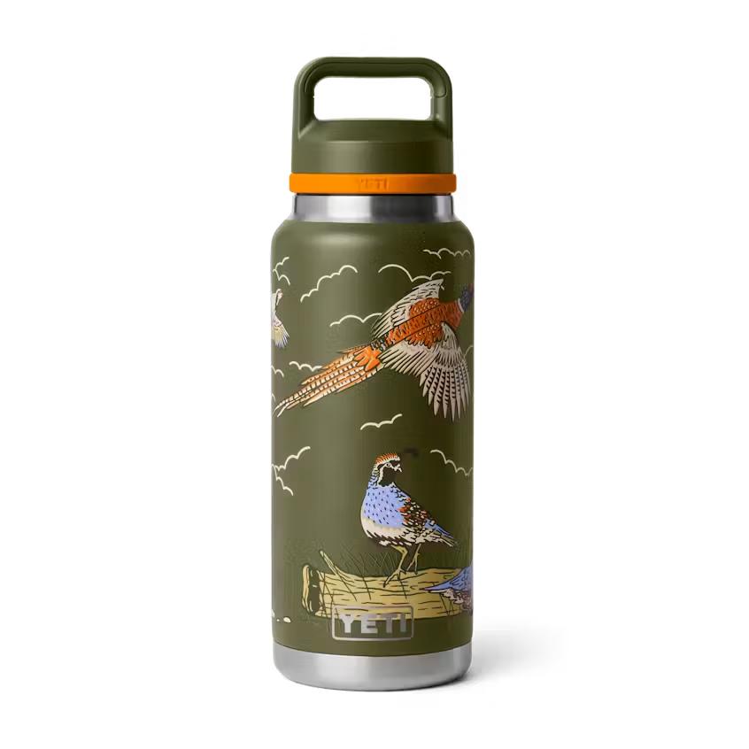 Olive green YETI Rambler 36 oz bottle with a pheasant and quail print, orange chug cap, and stainless steel base.
