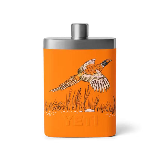Orange 7 oz. stainless steel Yeti flask featuring a pheasant illustration and embossed logo on a white background.