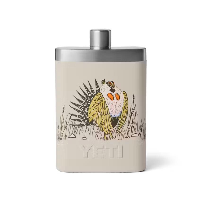 7 oz. stainless steel Yeti flask in tan with a grouse bird illustration and a leakproof silver cap.