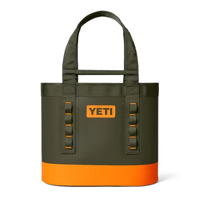 Olive green and bright orange YETI Camino Carryall 35 tote bag made of durable, waterproof material with utility loops.