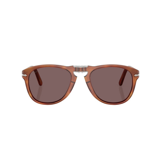 Persol Steve McQueen folding sunglasses with brown acetate pilot frames and polarized lenses.