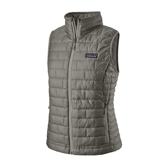 Grey Patagonia Nano Puff women's insulated vest with brick quilting, zippered handwarmer pockets, and logo patch.